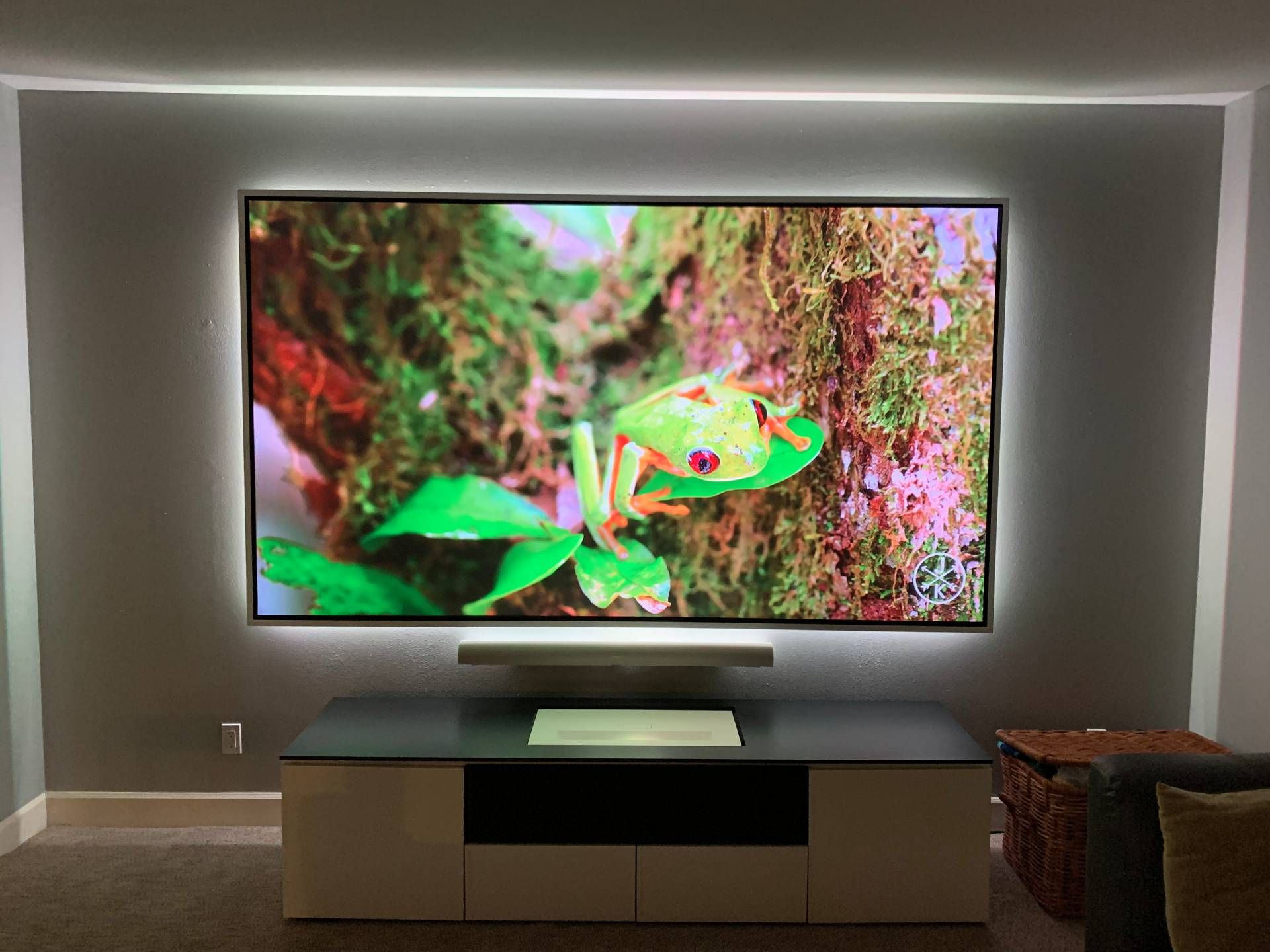 Wall mounted TV with backlighting